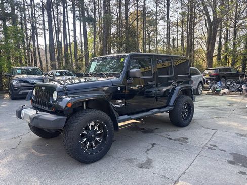 Used 2013 Jeep Wrangler Unlimited Sahara w/ Dual Top Group image 2