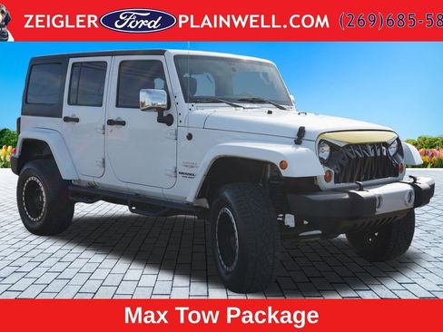 Used 2012 Jeep Wrangler Unlimited Sahara w/ Dual Top Group AWD/4WD image 7