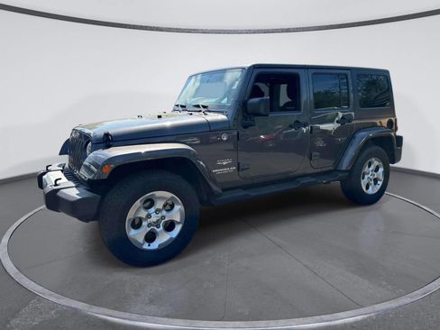 Used 2014 Jeep Wrangler Unlimited Sahara AWD/4WD image 1