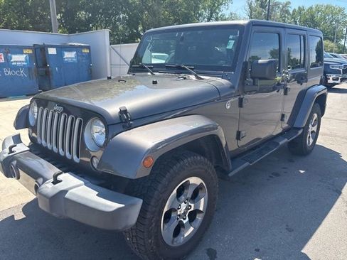 Used 2016 Jeep Wrangler Unlimited Sahara AWD/4WD image 1