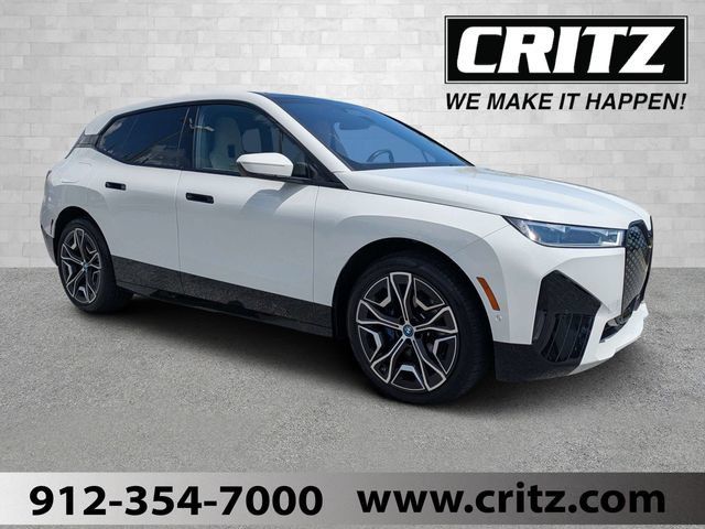 Used 2025 BMW iX xDrive50 w/ Premium Package AWD/4WD image 1