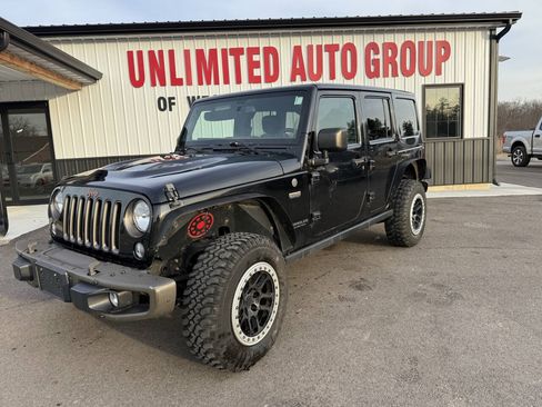 Used 2016 Jeep Wrangler Unlimited Sahara AWD/4WD image 1