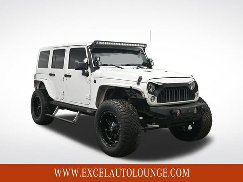 Used 2014 Jeep Wrangler Unlimited Sahara w/ Dual Top Group image 8
