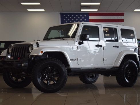 Used 2014 Jeep Wrangler Unlimited Sahara AWD/4WD image 13