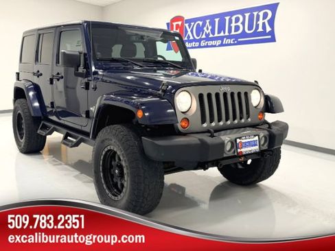 Used 2013 Jeep Wrangler Unlimited Sport AWD/4WD image 1
