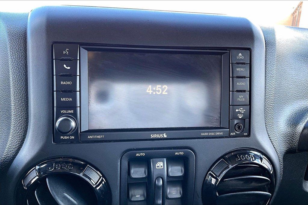 Used 2016 Jeep Wrangler Unlimited Sahara AWD/4WD image 13