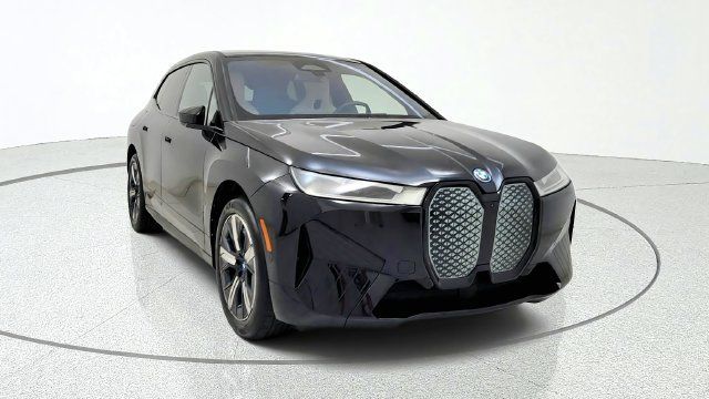 Used 2024 BMW iX xDrive50 w/ Premium Package AWD/4WD image 1