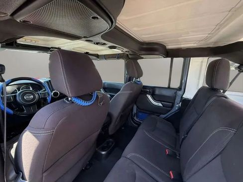 Used 2015 Jeep Wrangler Unlimited Rubicon w/ Dual Top Group AWD/4WD image 17