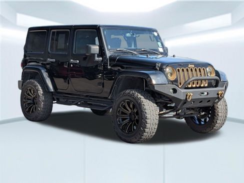 Used 2014 Jeep Wrangler Unlimited Sahara AWD/4WD image 8