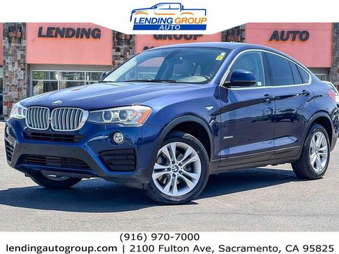Used 2016 BMW X4 xDrive28i AWD/4WD image 1