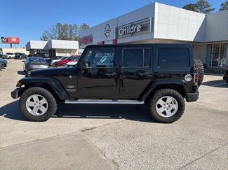 Used 2012 Jeep Wrangler Unlimited Sahara w/ Dual Top Group video 1