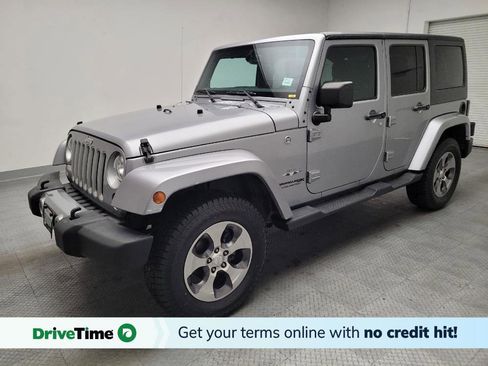 Used 2018 Jeep Wrangler Unlimited Sahara AWD/4WD image 1