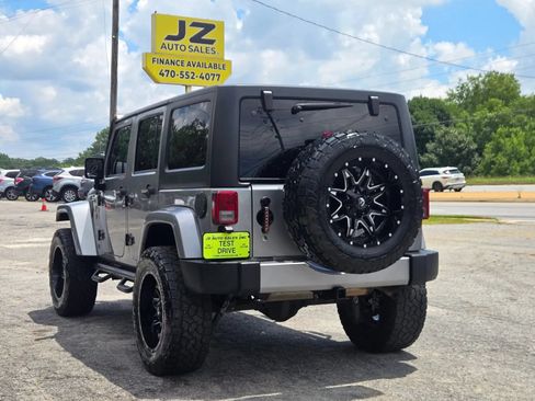 Used 2016 Jeep Wrangler Unlimited Sahara w/ Dual Top Group AWD/4WD image 4
