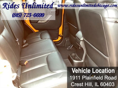 Used 2013 Jeep Wrangler Unlimited Sahara w/ Dual Top Group AWD/4WD image 24