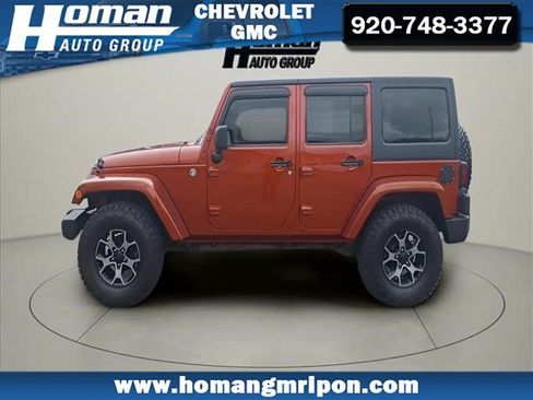Used 2014 Jeep Wrangler Unlimited Sahara w/ Dual Top Group AWD/4WD image 2