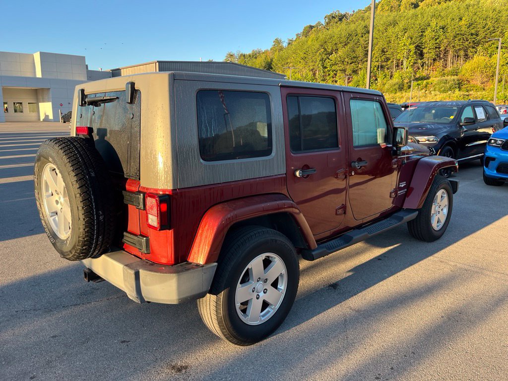 Used 2010 Jeep Wrangler Unlimited Sahara w/ Dual Top Group AWD/4WD image 3