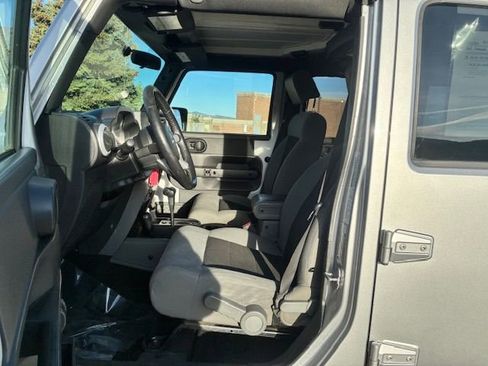 Used 2010 Jeep Wrangler Unlimited Sahara w/ Dual Top Group AWD/4WD image 11