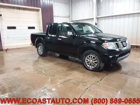 Used 2014 Nissan Frontier SV image 1