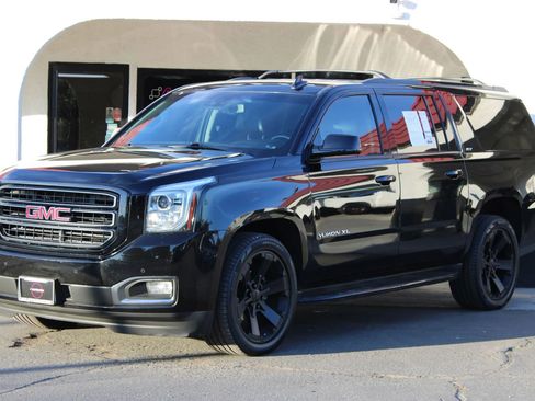 Used 2019 GMC Yukon XL SLT w/ Graphite Performance Edition image 1