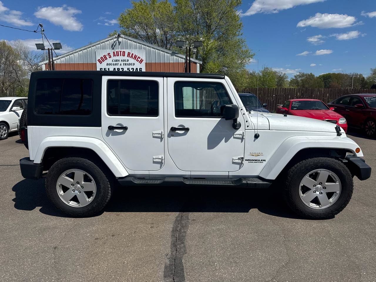 Used 2012 Jeep Wrangler Unlimited Sahara w/ Dual Top Group AWD/4WD image 4