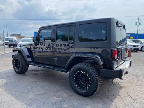 Used 2013 Jeep Wrangler Unlimited Sahara w/ Dual Top Group AWD/4WD image 6