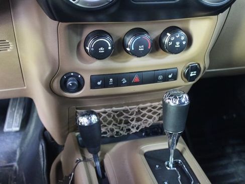 Used 2014 Jeep Wrangler Unlimited Sahara w/ Dual Top Group AWD/4WD image 17
