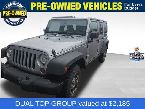 Used 2013 Jeep Wrangler Unlimited Rubicon w/ Dual Top Group AWD/4WD image 1