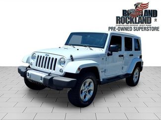 Used 2015 Jeep Wrangler Unlimited Sahara w/ Dual Top Group AWD/4WD video 1