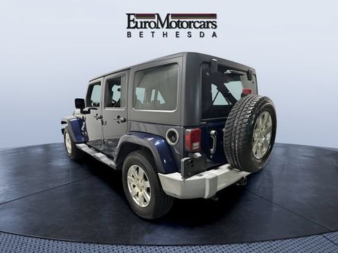 Used 2013 Jeep Wrangler Unlimited Sahara w/ Dual Top Group AWD/4WD image 3