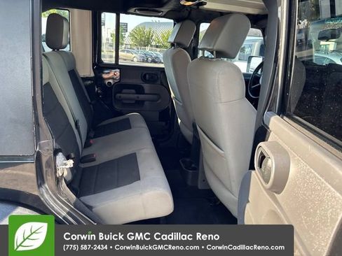 Used 2010 Jeep Wrangler Unlimited Rubicon w/ Dual Top Group AWD/4WD image 16