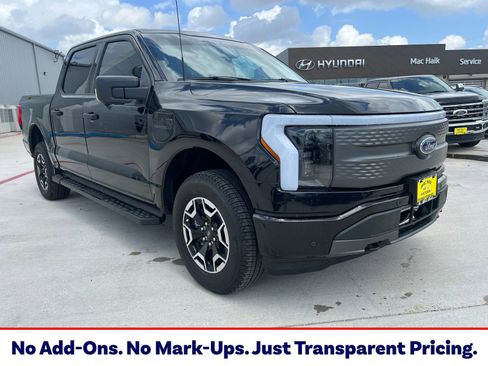 Used 2023 Ford F150 Lightning XLT AWD/4WD image 1