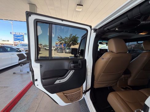 Used 2013 Jeep Wrangler Unlimited Sahara w/ Dual Top Group AWD/4WD image 13