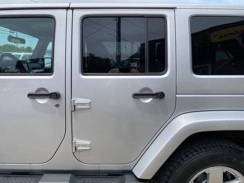 Used 2012 Jeep Wrangler Unlimited Sahara w/ Dual Top Group AWD/4WD image 60
