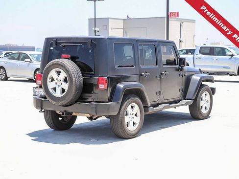 Used 2010 Jeep Wrangler Unlimited Sahara w/ Dual Top Group AWD/4WD image 6