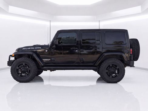 Used 2012 Jeep Wrangler Unlimited Rubicon w/ Connectivity Group AWD/4WD image 2