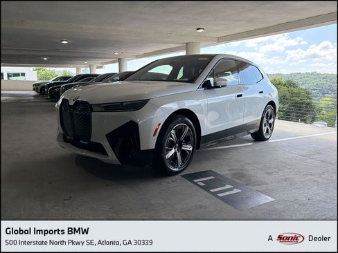 Used 2024 BMW iX xDrive50 w/ Premium Package AWD/4WD image 1