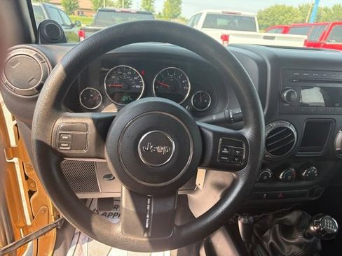 Used 2013 Jeep Wrangler Unlimited Sport w/ Mopar Black Appearance Group AWD/4WD image 23