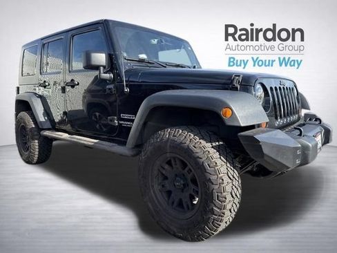 Used 2013 Jeep Wrangler Unlimited Sport AWD/4WD image 1