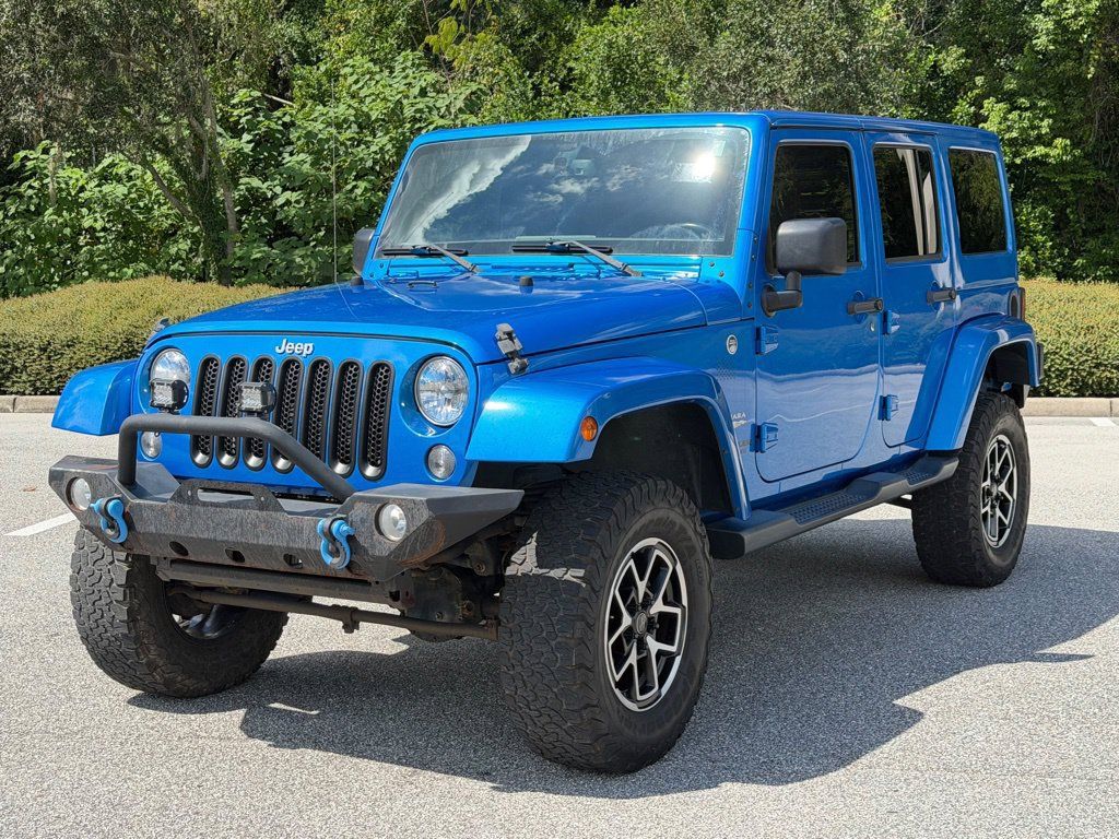 Used 2015 Jeep Wrangler Unlimited Sahara w/ Dual Top Group AWD/4WD image 1