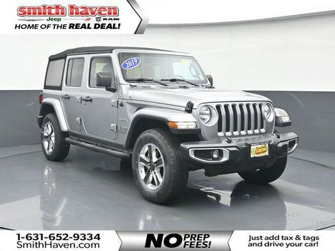 Certified 2019 Jeep Wrangler Unlimited Sahara w/ Cold Weather Group AWD/4WD image 1