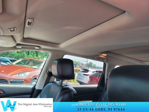 Used 2014 Nissan Pathfinder Platinum w/ Platinum Premium Package AWD/4WD image 12