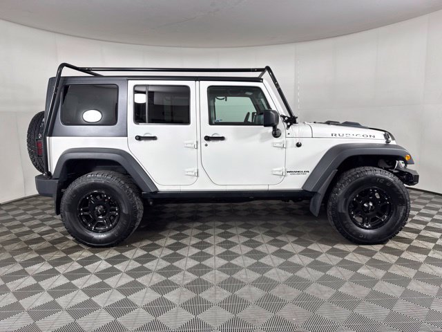Used 2010 Jeep Wrangler Unlimited Rubicon w/ Dual Top Group AWD/4WD image 2