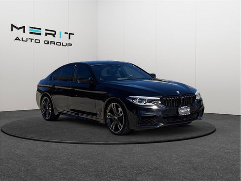 Used 2020 BMW M550i xDrive w/ Executive Package image 1