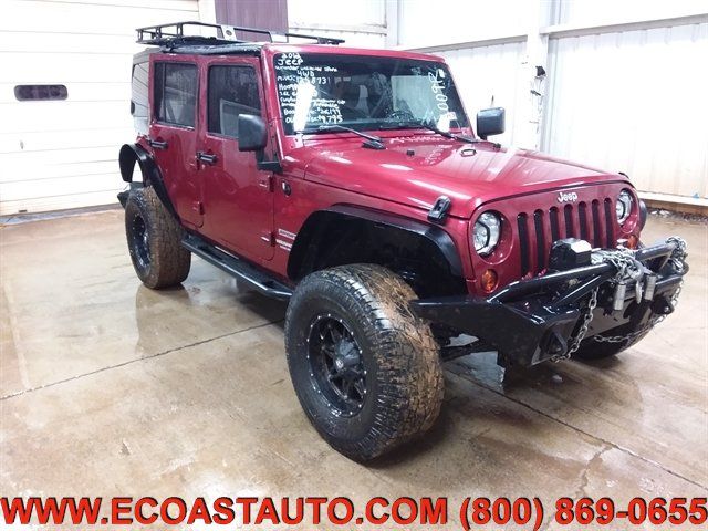 Used 2012 Jeep Wrangler Unlimited Sport w/ Connectivity Group AWD/4WD image 1
