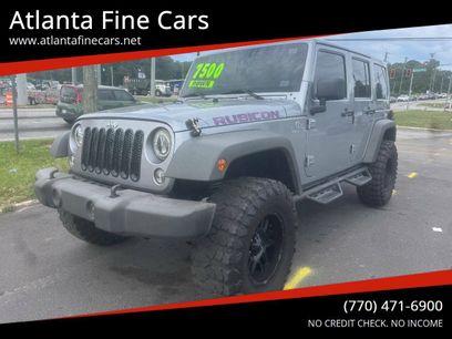 Used 2014 Jeep Wrangler Unlimited Rubicon w/ Dual Top Group
