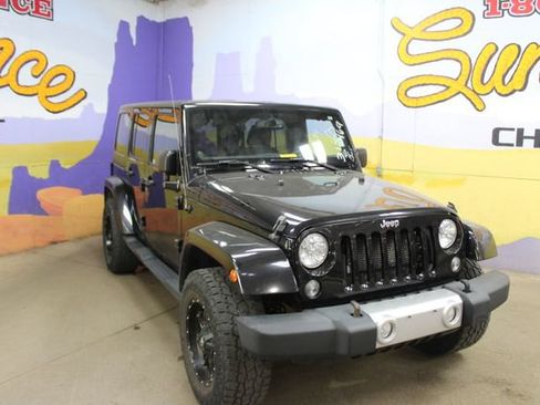 Used 2014 Jeep Wrangler Unlimited Sahara w/ Dual Top Group AWD/4WD image 2