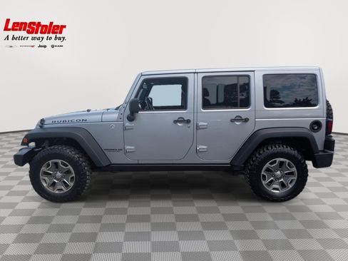 Used 2014 Jeep Wrangler Unlimited Rubicon w/ Dual Top Group AWD/4WD image 2