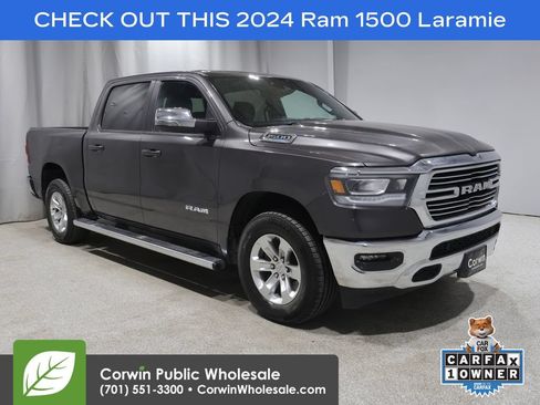 Used 2024 RAM 1500 Laramie AWD/4WD image 1