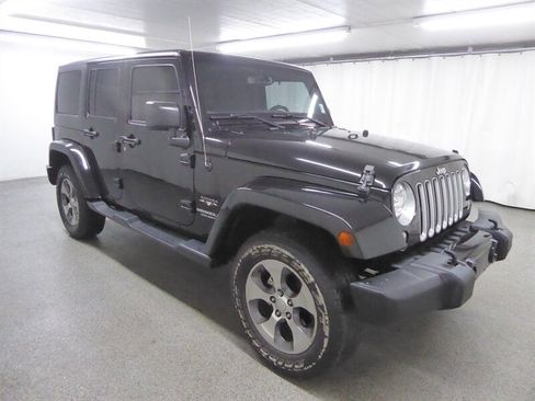 Used 2016 Jeep Wrangler Unlimited Sahara w/ Connectivity Group image 1