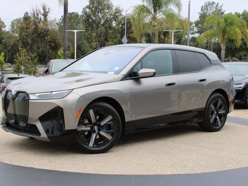 Used 2025 BMW iX xDrive50 w/ Premium Package AWD/4WD image 1